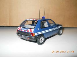 Прикрепленное изображение: Colobox_Peugeot_205_Gendarmerie_Norev~02.jpg