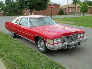 1974_Cadillac_Coupe_DeVille_red_fvr.thumb.jpg.36d5b726d2e4b4233159988477d60982.jpg