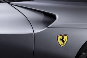 2023-ferrari-purosangue-badge-1662737067.thumb.jpg.8f7a837ff05a986903ab3f628efae211.jpg