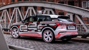 220823762_audi-q4-e-tron-prototype-exterior(9).thumb.jpg.d6864148e8fb05d6240ad4e687dec97e.jpg